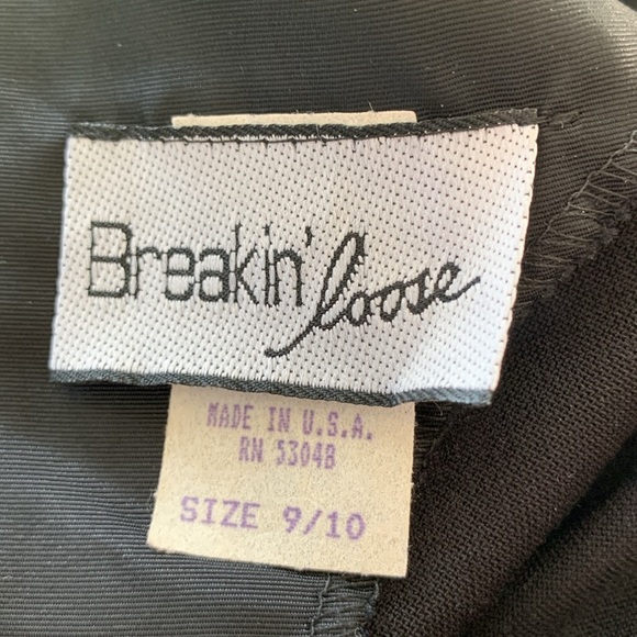 Chic Black and Gold Midi Dress with Elegant Design - Picture 9 of 16